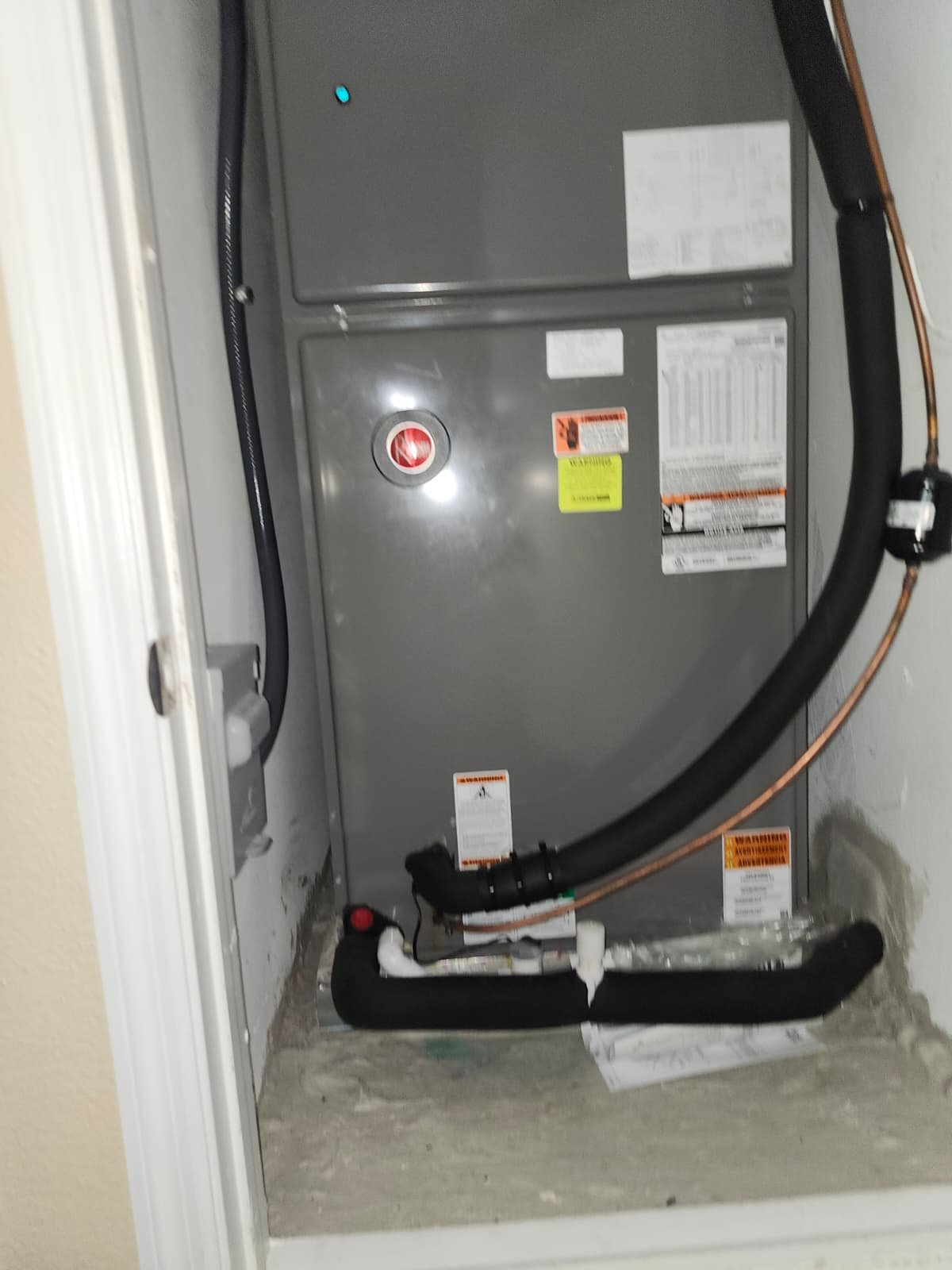 HVAC unit installed in closet space, part of Value Air Duct Cleaning in Lutz, FL 33558.