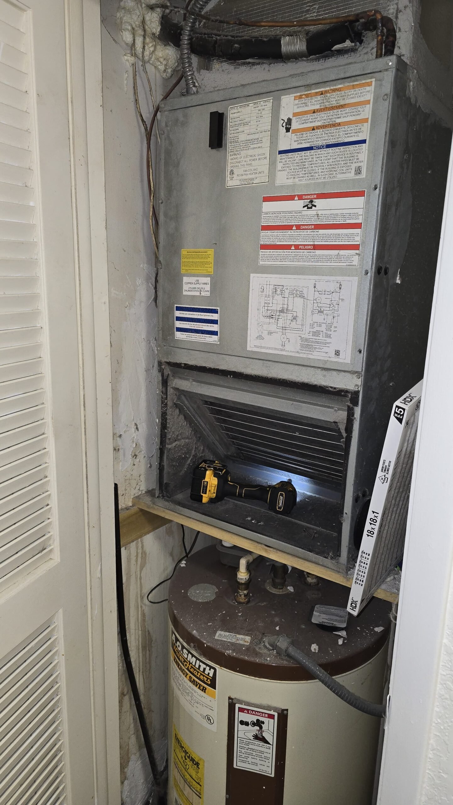 Partially installed HVAC unit with tools visible in Tampa, FL 33618.