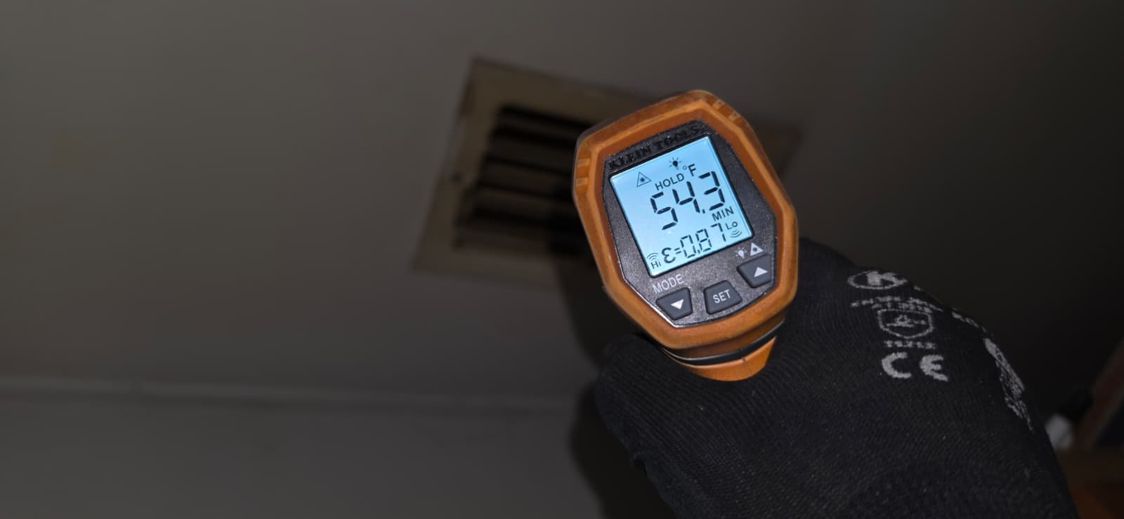 Infrared Thermometer - Tampa, FL 33611 Infrared thermometer showing temperature reading at a vent in Tampa, FL 33611.
