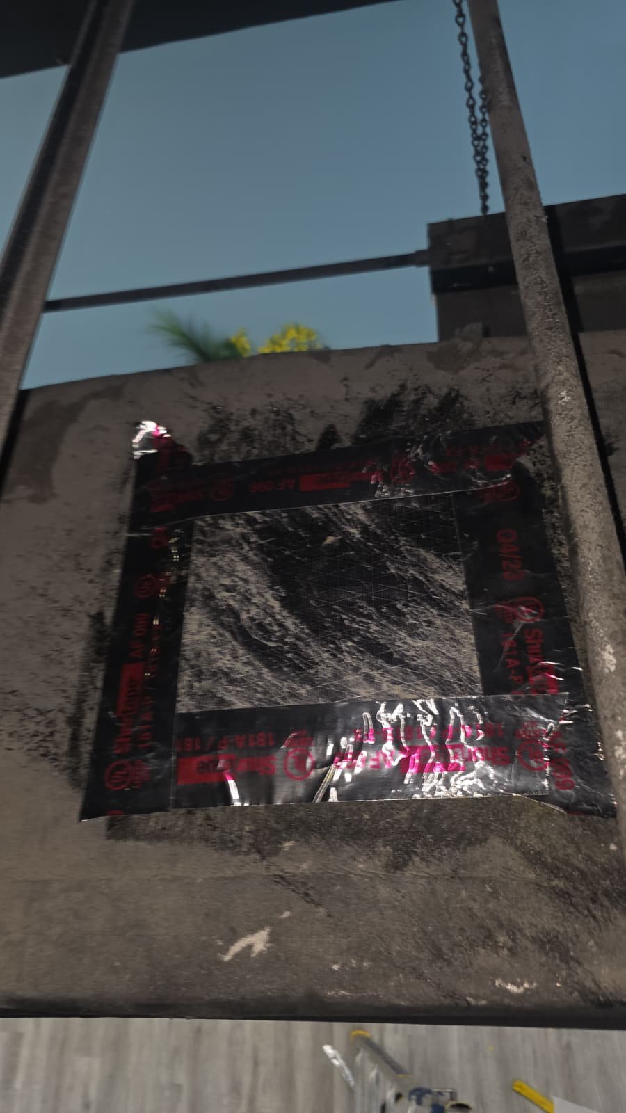 Large ductwork patch secured with metallic tape in Clearwater, FL 33761.