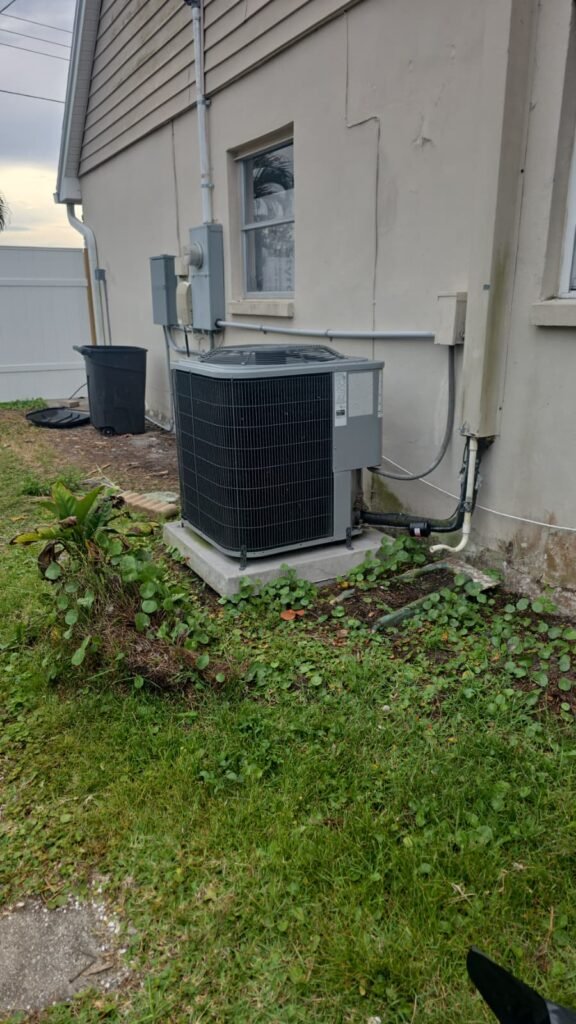 A newly installed outdoor AC unit on its pad in Tampa, FL 33615.