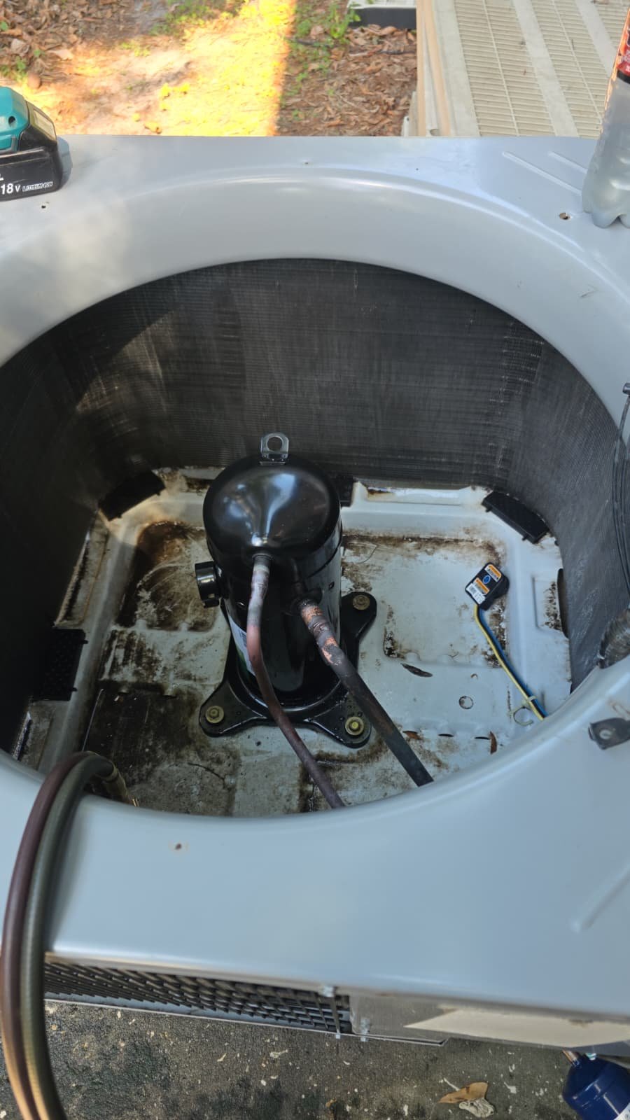 Open AC Unit with Compressor - Lutz, FL 33558 Open AC unit showing compressor and wiring in Lutz, FL 33558.