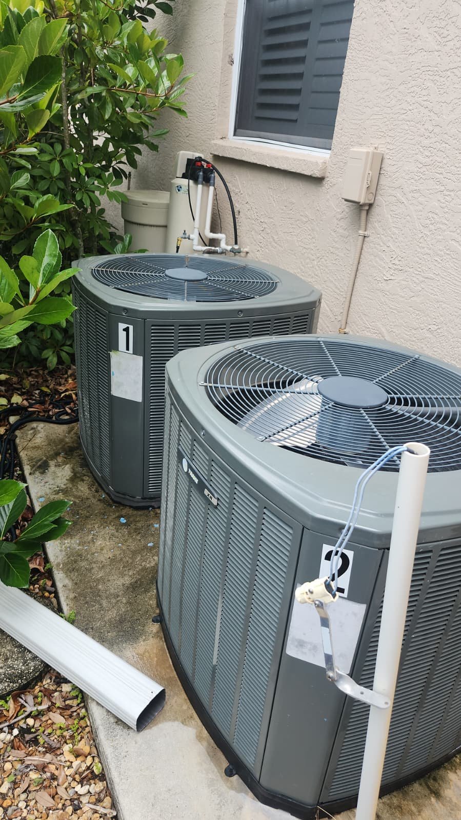 Outdoor AC Units Installed - Lakewood Ranch, FL 34202 Two outdoor AC units installed beside a house in Lakewood Ranch, FL 34202.