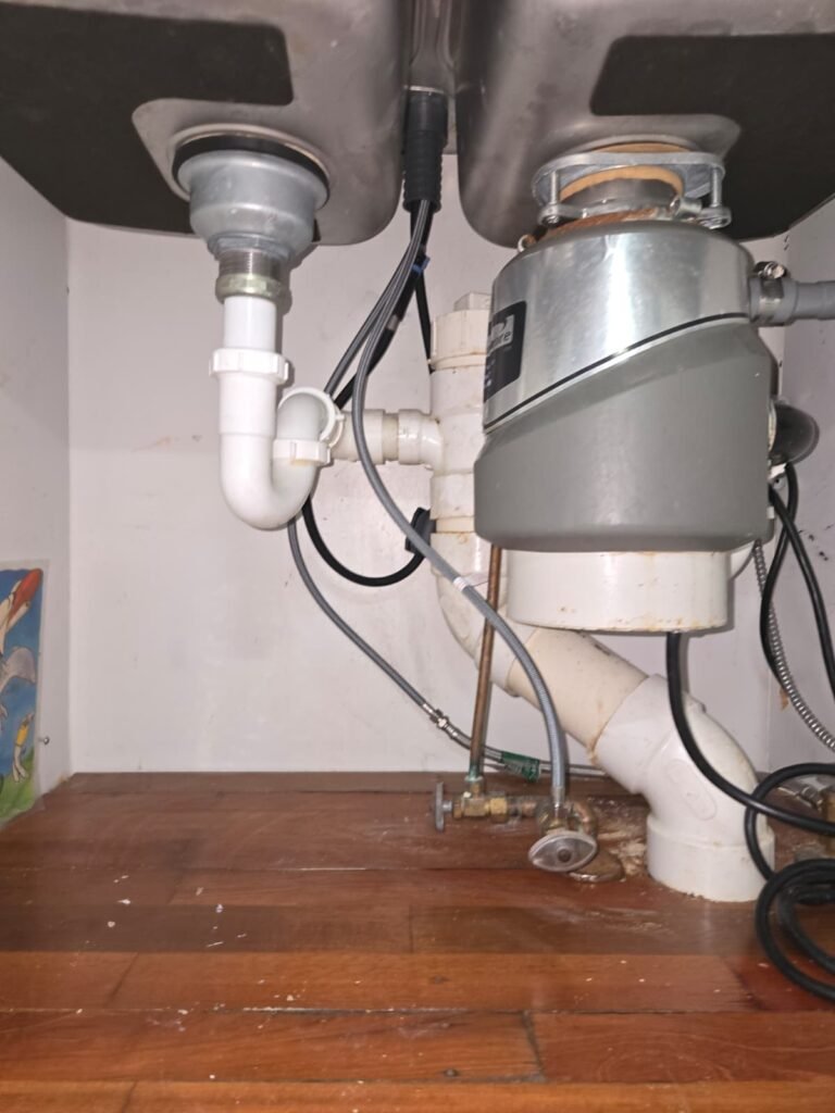 A garbage disposal connected to the kitchen sink drain in Riverview, FL 33569.