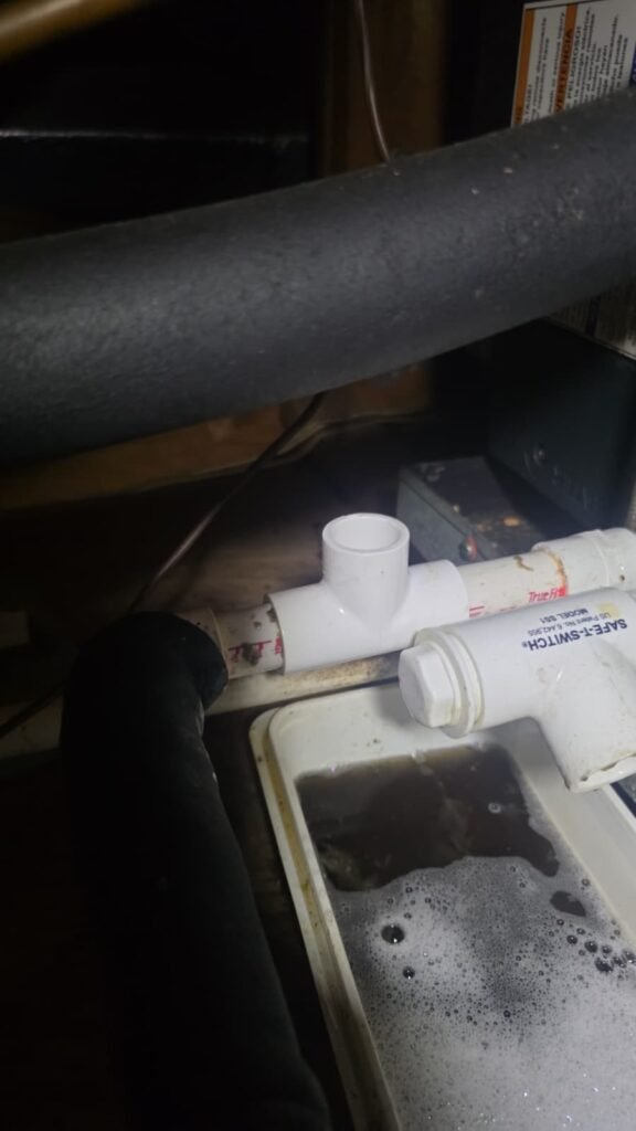 PVC drain line repair with water tray, St. Petersburg, FL 33703.