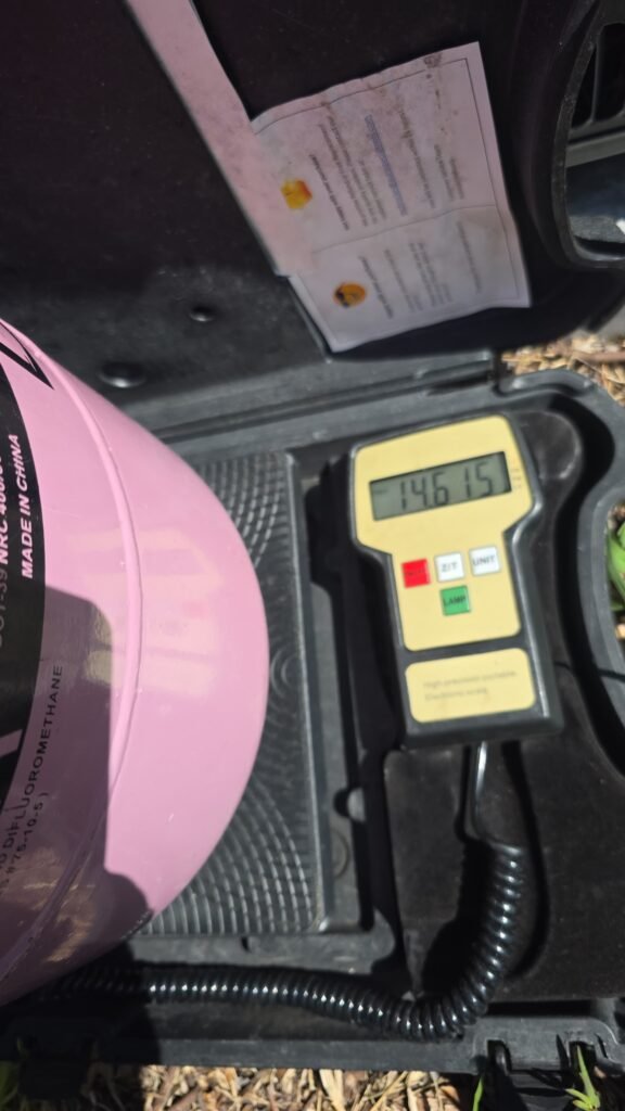 An R-410A tank on a refrigerant scale in Riverview, FL 33579.