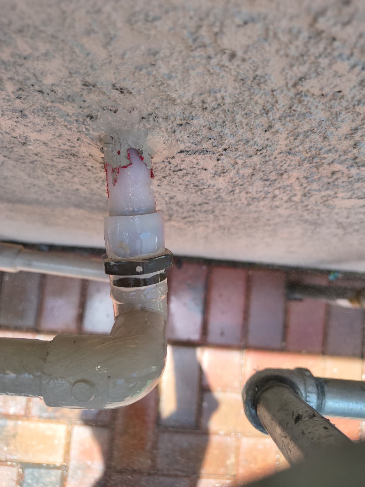 Repaired PEX Pipe Connection - Apollo Beach, FL 33572 Close-up of repaired PEX pipe connection with sealant in Apollo Beach, FL 33572.