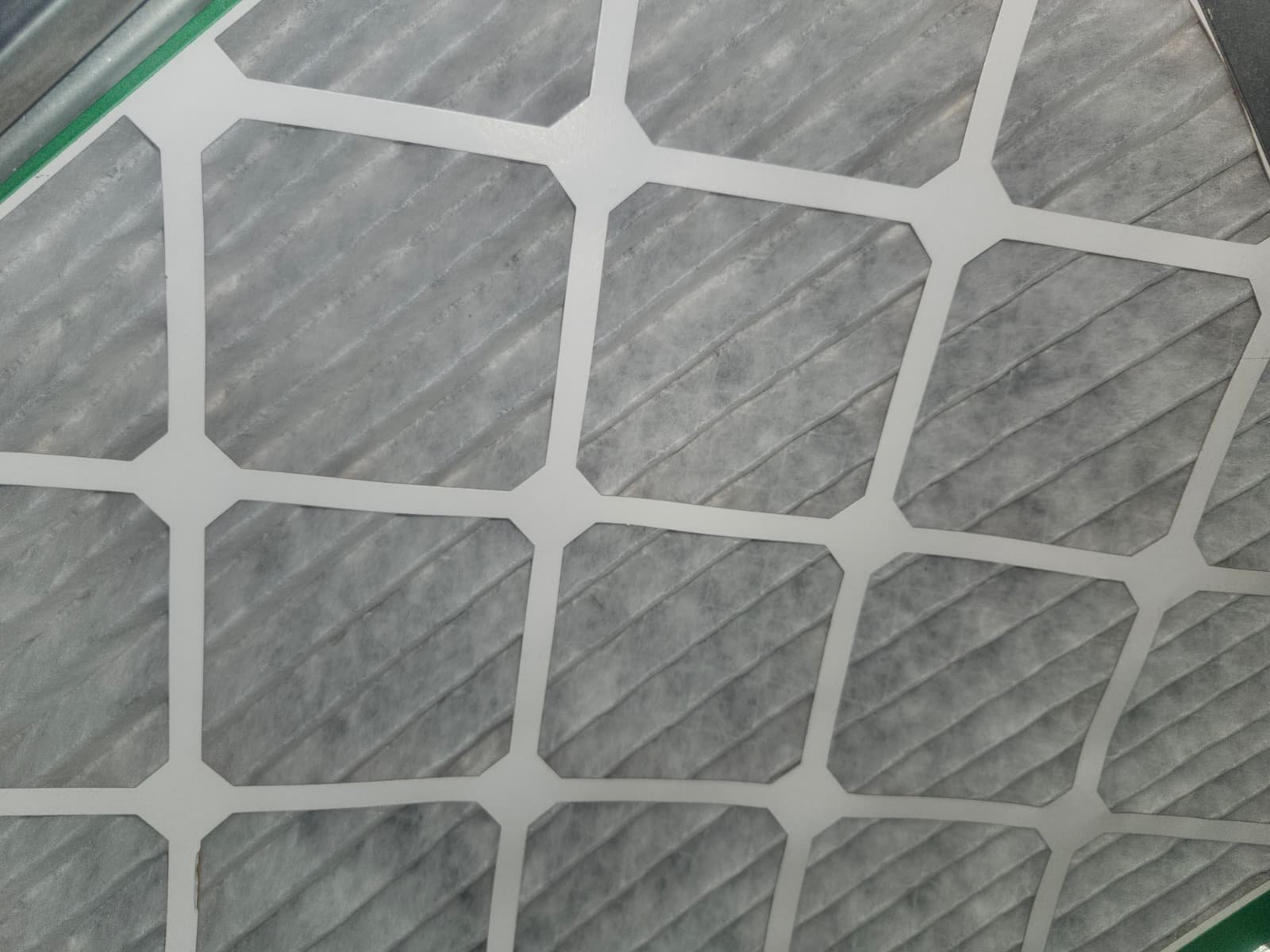 Used Air Filter Detail - Tampa, FL 33611 Close-up of used air filter showing dirt in Tampa, FL 33611.