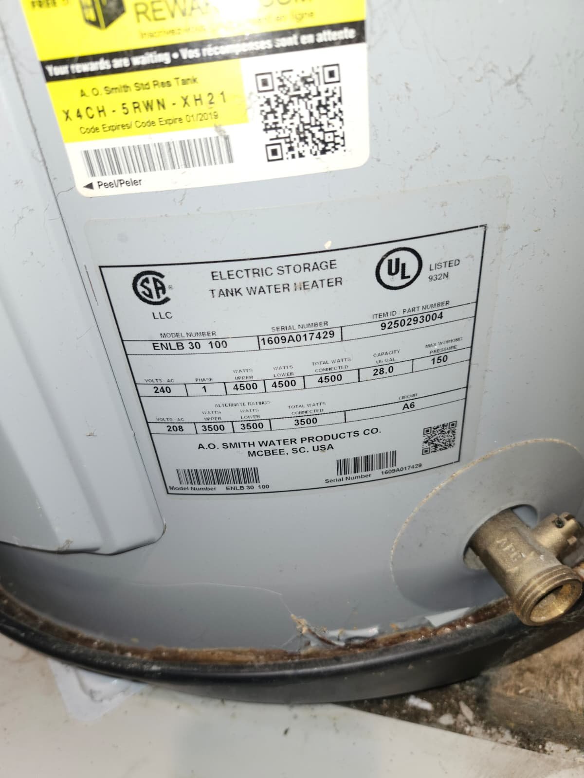 Close-up of water heater label showing specs in Brandon, FL 33511.