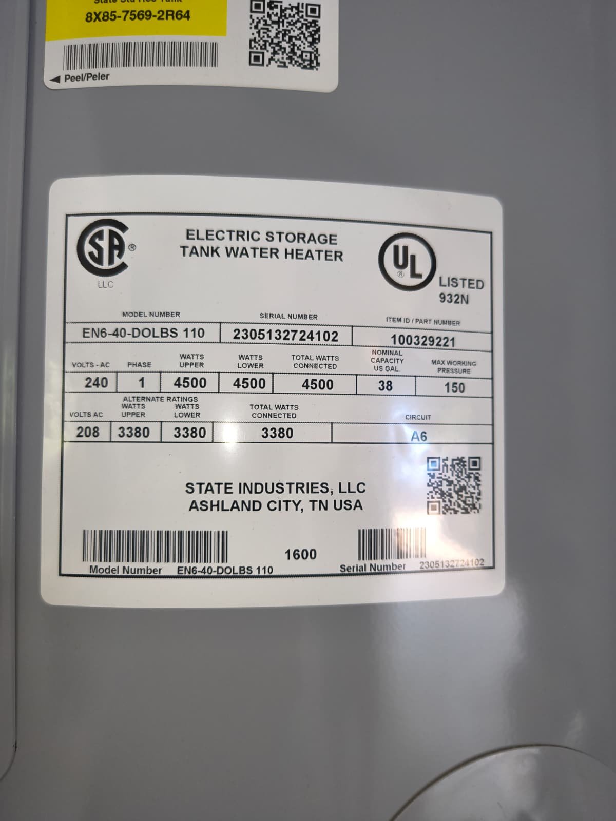 Close-up of water heater specification label, plumbing detail, St. Petersburg, FL 33703.