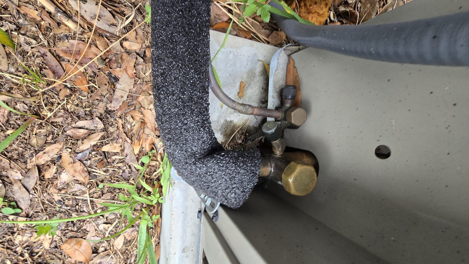 AC unit connections and insulation from above, Tampa, FL 33613.