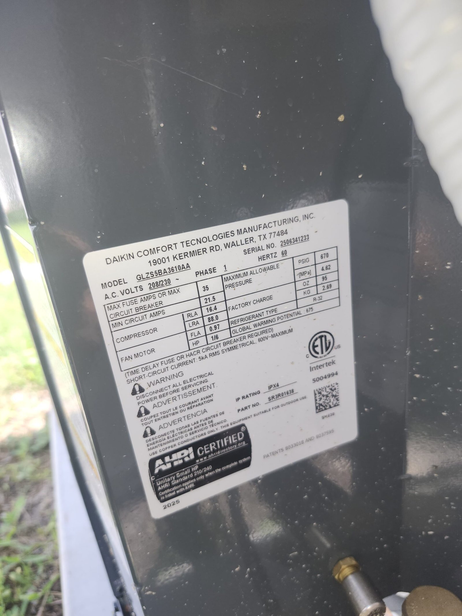 Close-up of AC unit label showing specs, free diagnosis in Brandon, FL 33511.