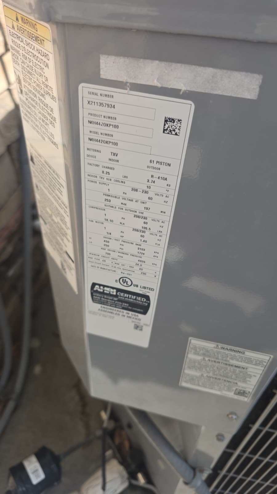 AC Unit Label in New Port Richey, FL 34655 Close-up of AC unit label with specifications in New Port Richey, FL 34655.