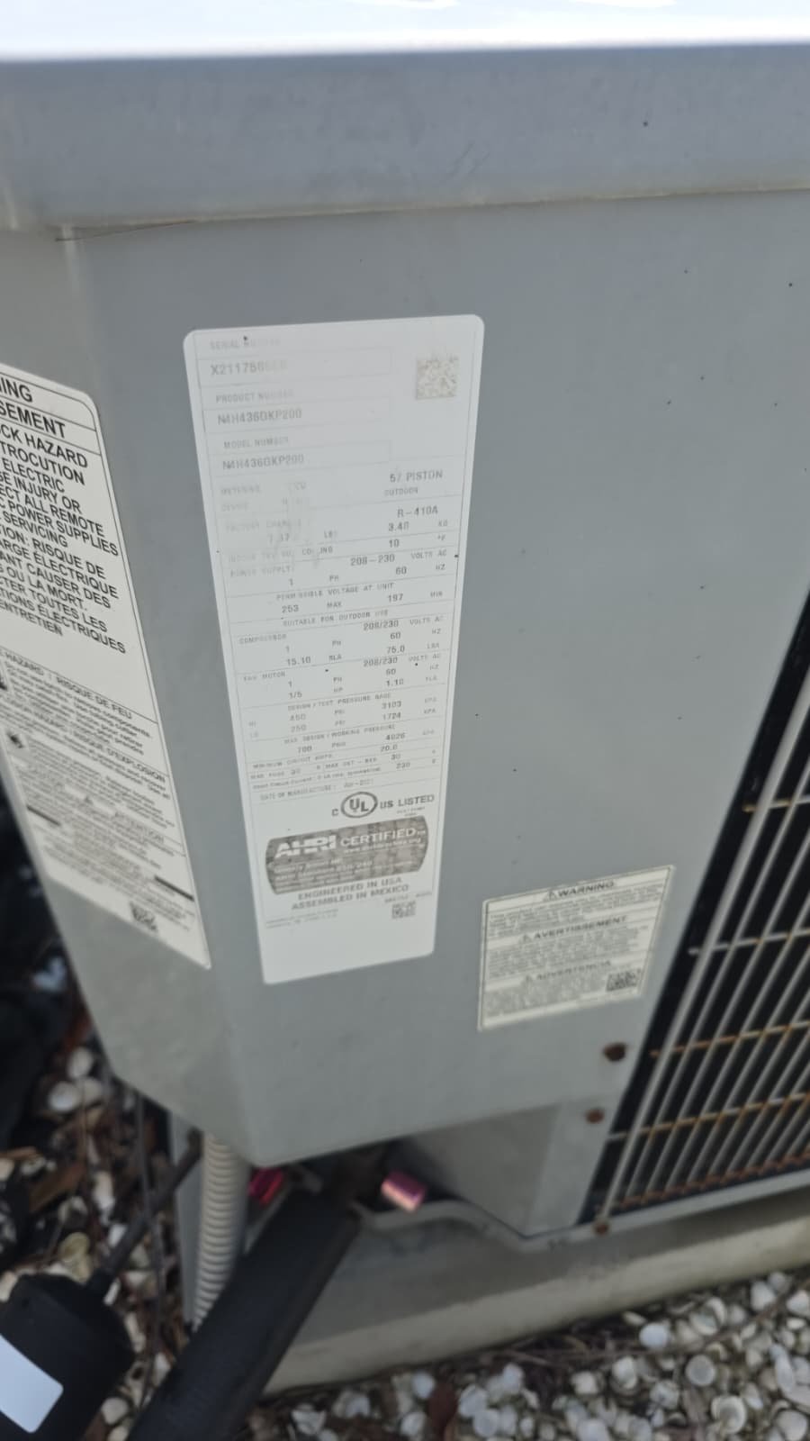 AC Unit Label and Specs - Tarpon Springs, FL 34688 Close-up of an air conditioning unit's label and specifications in Tarpon Springs, FL 34688. Detailed equipment info.