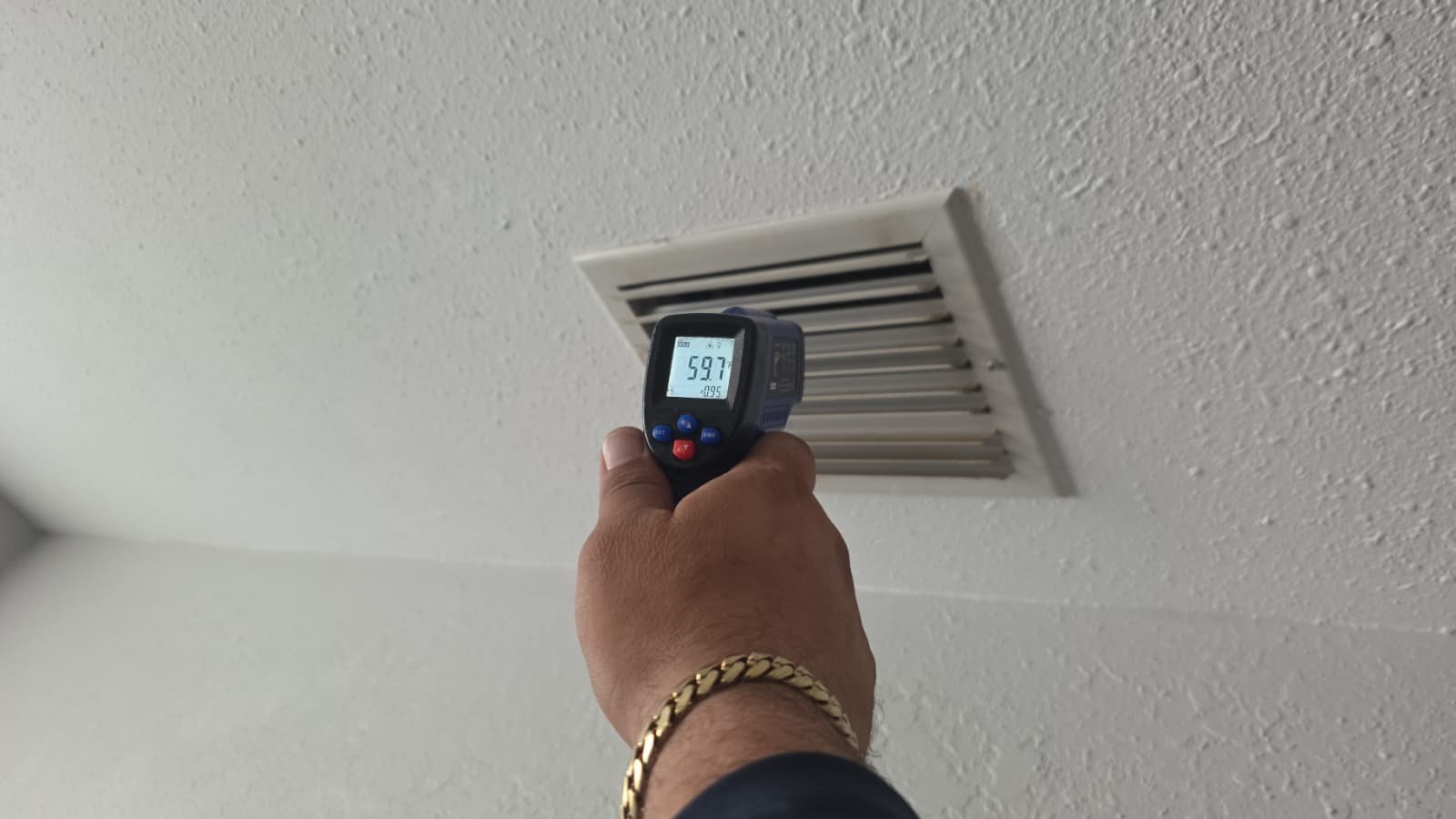 Air Vent Temperature Check - Largo, FL 33773 Checking air vent temperature with infrared thermometer in Largo, FL 33773.