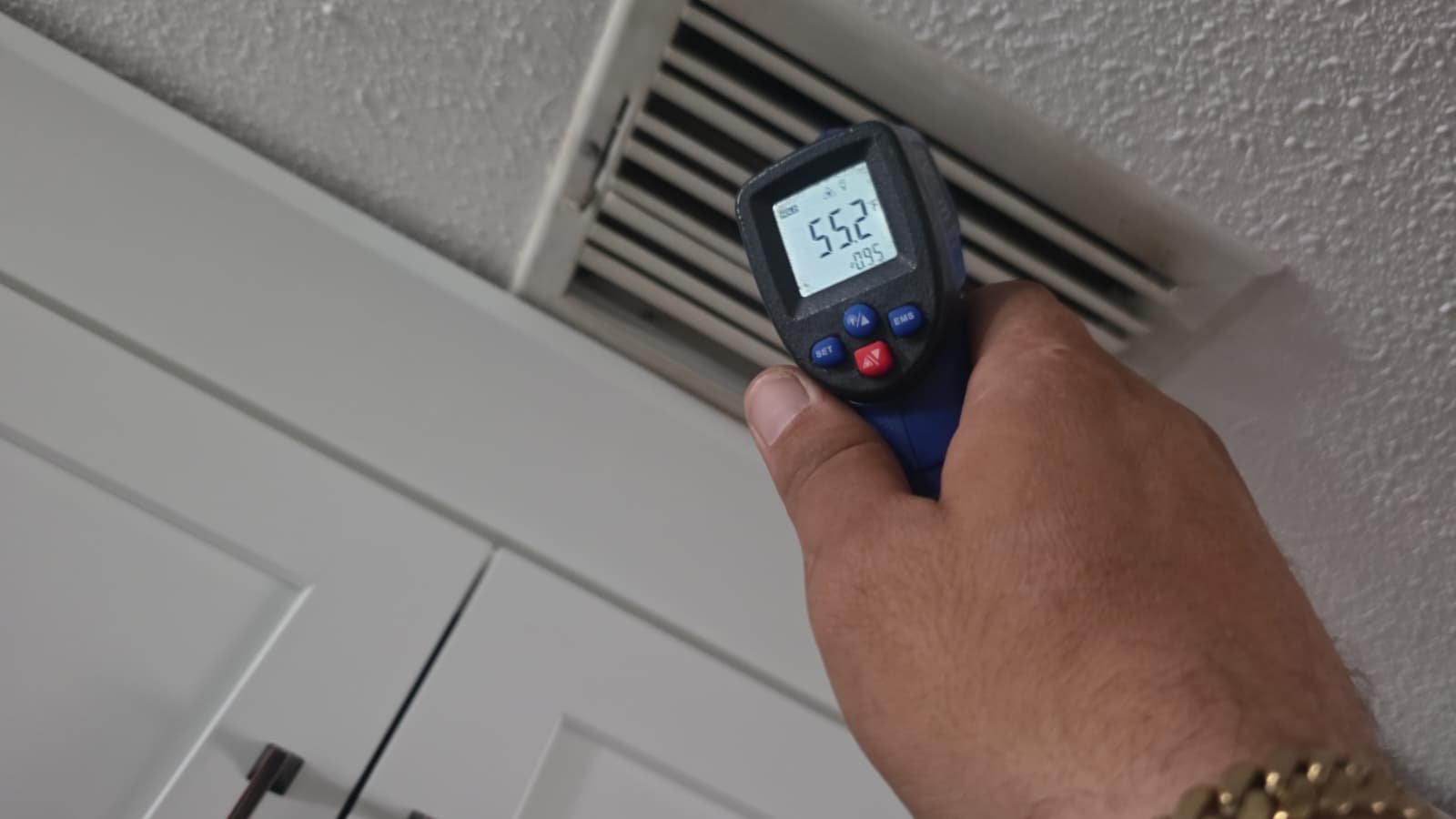 Air Vent Temperature Check - Largo, FL 33773 Measuring air vent temperature with infrared thermometer in Largo, FL 33773.
