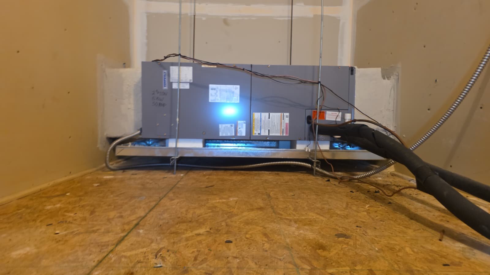 Attic HVAC Installation in New Port Richey, FL 34655 HVAC unit with wiring and ductwork in attic in New Port Richey, FL 34655.