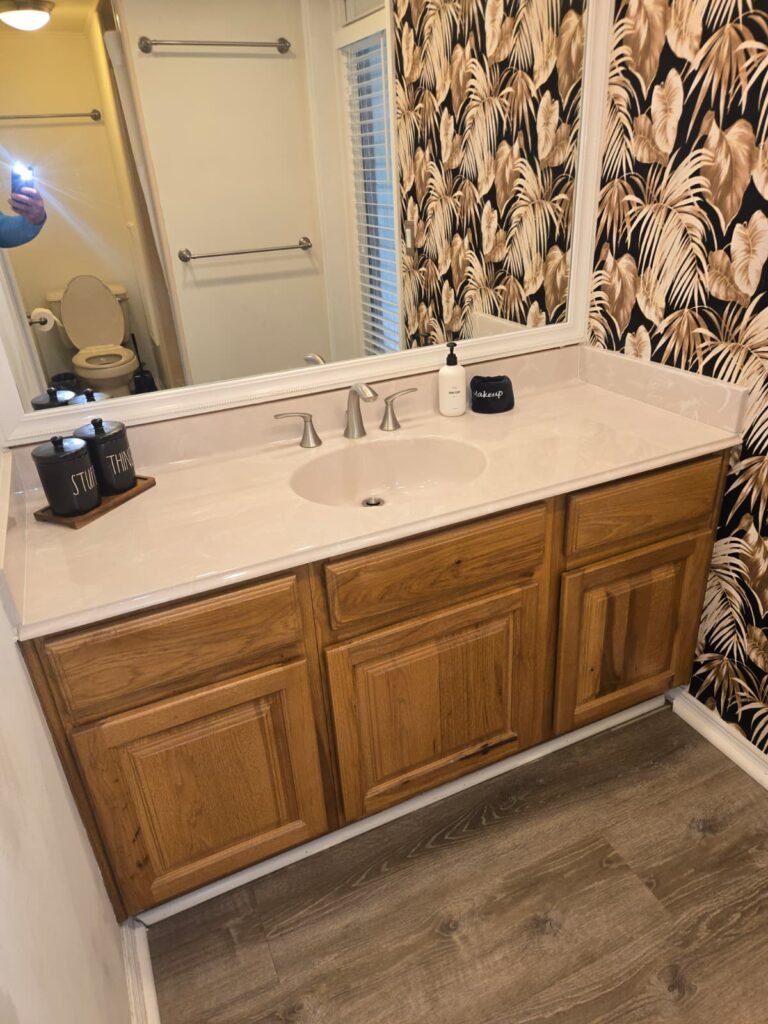 Bathroom Sink Vanity in Seminole, FL 33776 Single sink vanity with wallpaper, Seminole, FL 33776