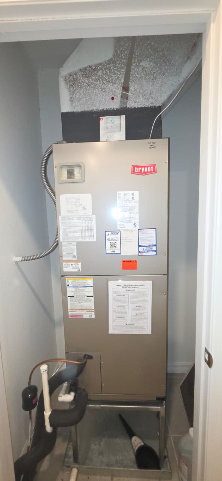 Bryant HVAC system installed in closet space in Odessa, FL 33556. Efficient heating and cooling.