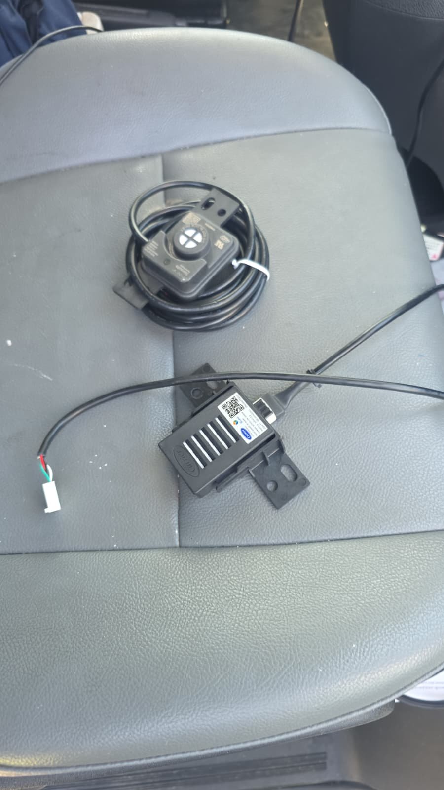 Sensors and wiring on a car seat in Largo, FL 33771.