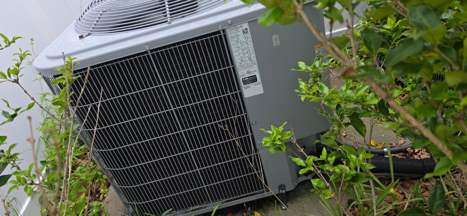 Carrier AC Unit Installed - Spring Hill, FL 34609 New Carrier AC unit installed on concrete pad in Spring Hill, FL 34609. Enhances cooling efficiency.