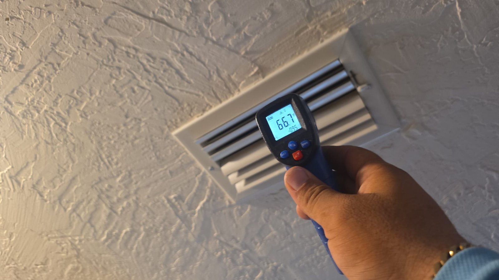 Checking air temperature from vent in Largo, FL 33774.