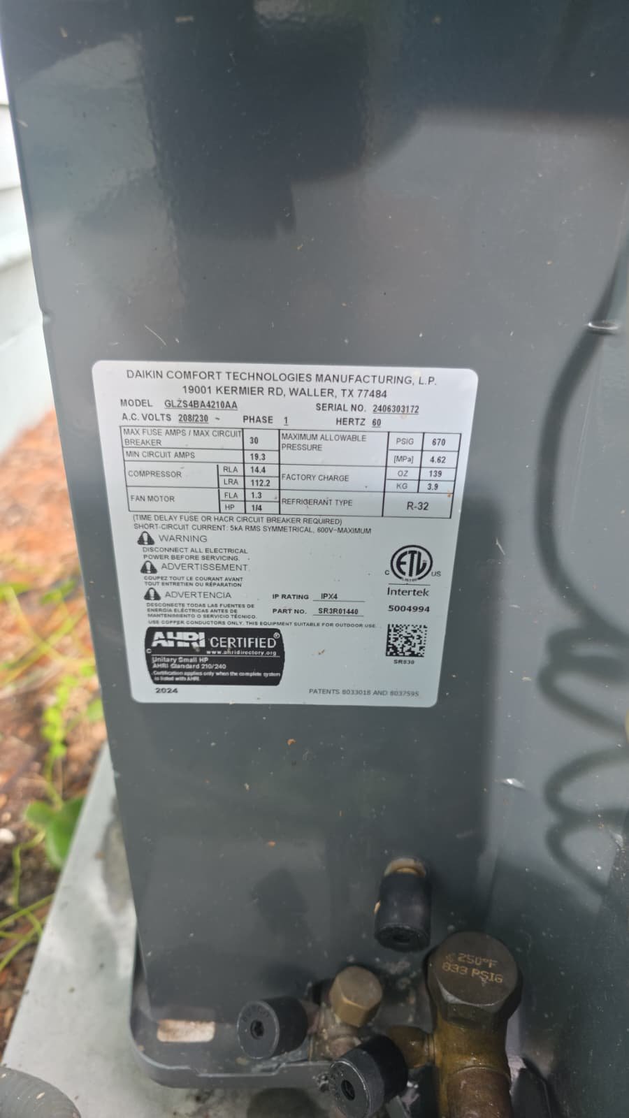 Daikin AC Label Detail - Tampa, FL 33616 Close-up of Daikin AC unit's label, Premium Therapy Plan, Tampa, FL 33616.