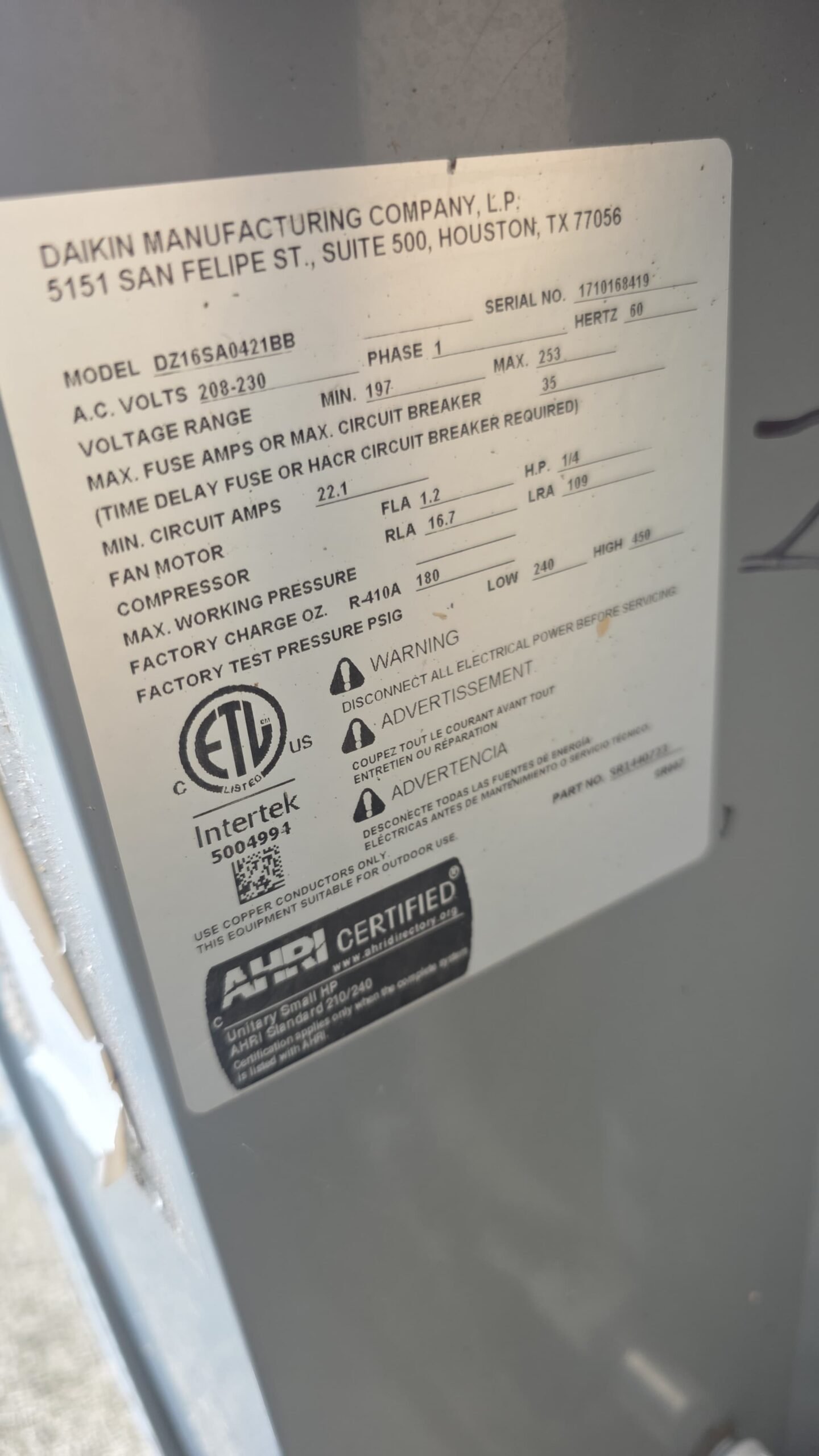 Daikin AC unit specification label close-up, Elite Therapy Visit #7, Bradenton, FL 34202.