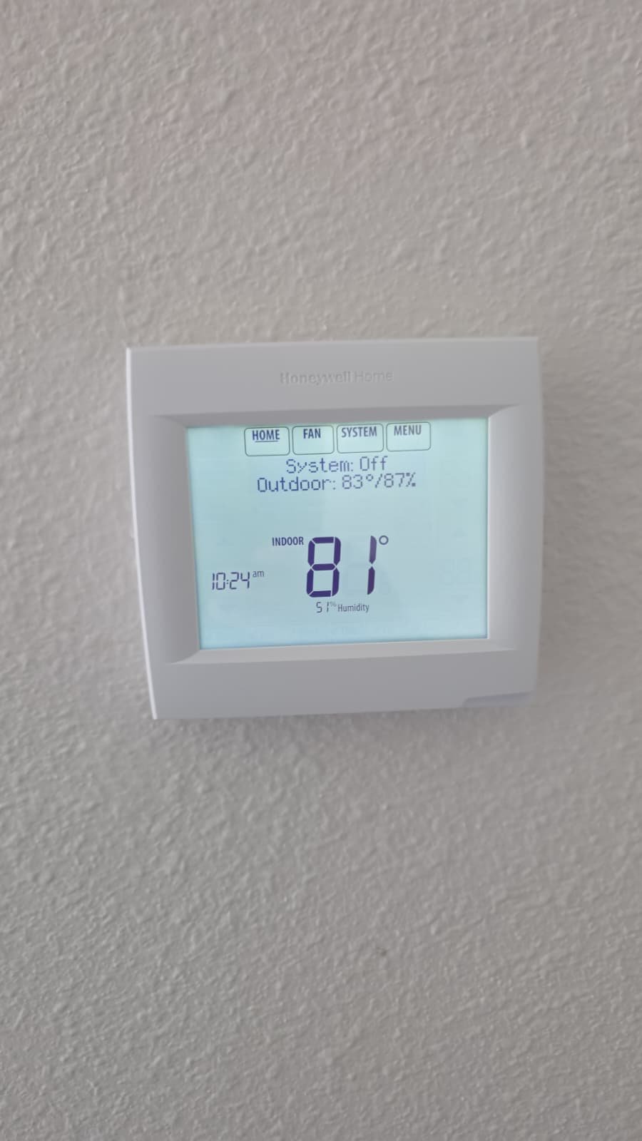 Digital Thermostat Display - Tarpon Springs, FL 34688 Close-up of a digital thermostat displaying indoor temperature in Tarpon Springs, FL 34688. Accurate climate control.