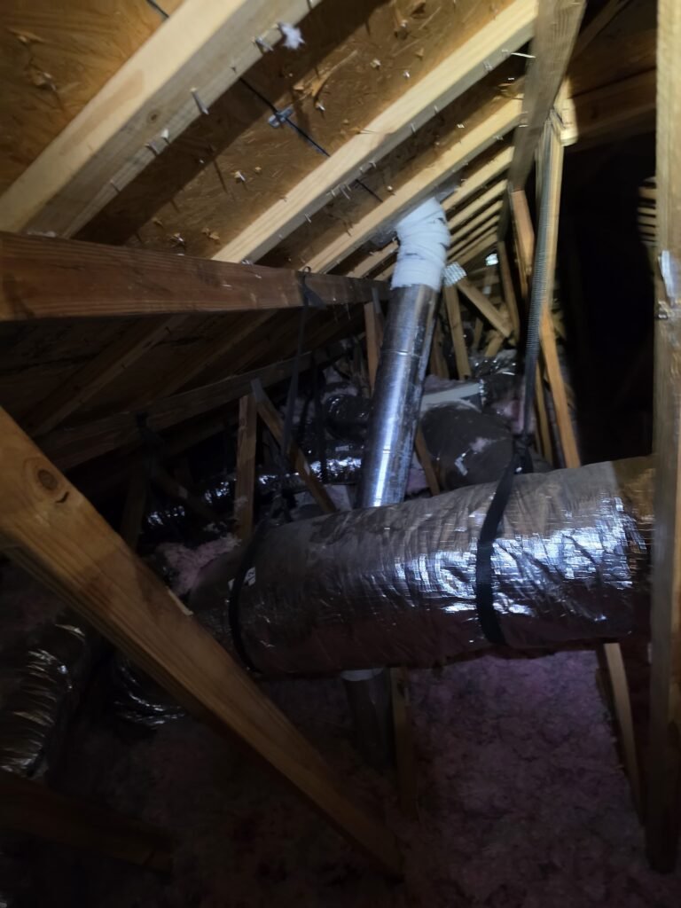Ductwork in dim attic space, San Antonio, FL 33576