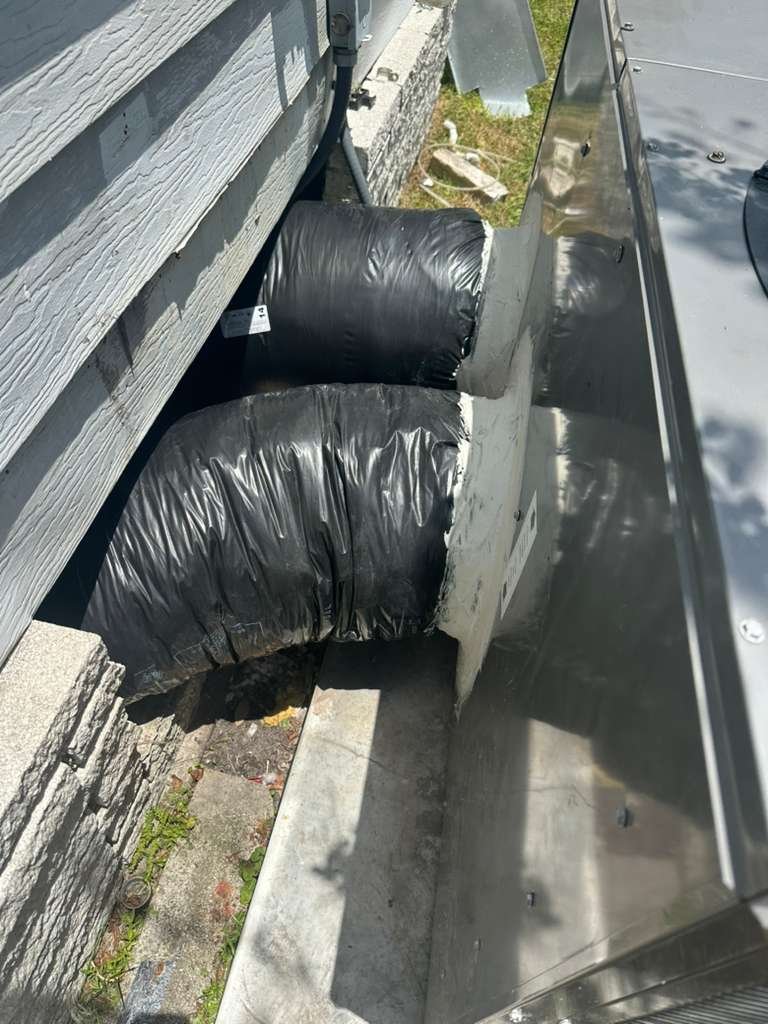 Completed ductwork installation connected to exterior unit in Plant City, FL 33565.