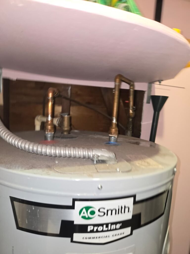 Dusty Old Water Heater in Tampa, FL 33616 Dusty AO Smith water heater before replacement in Tampa, FL 33616