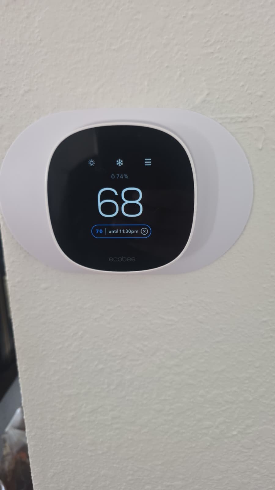 Ecobee thermostat set to lower temperature for heating service in Largo, FL 33771.