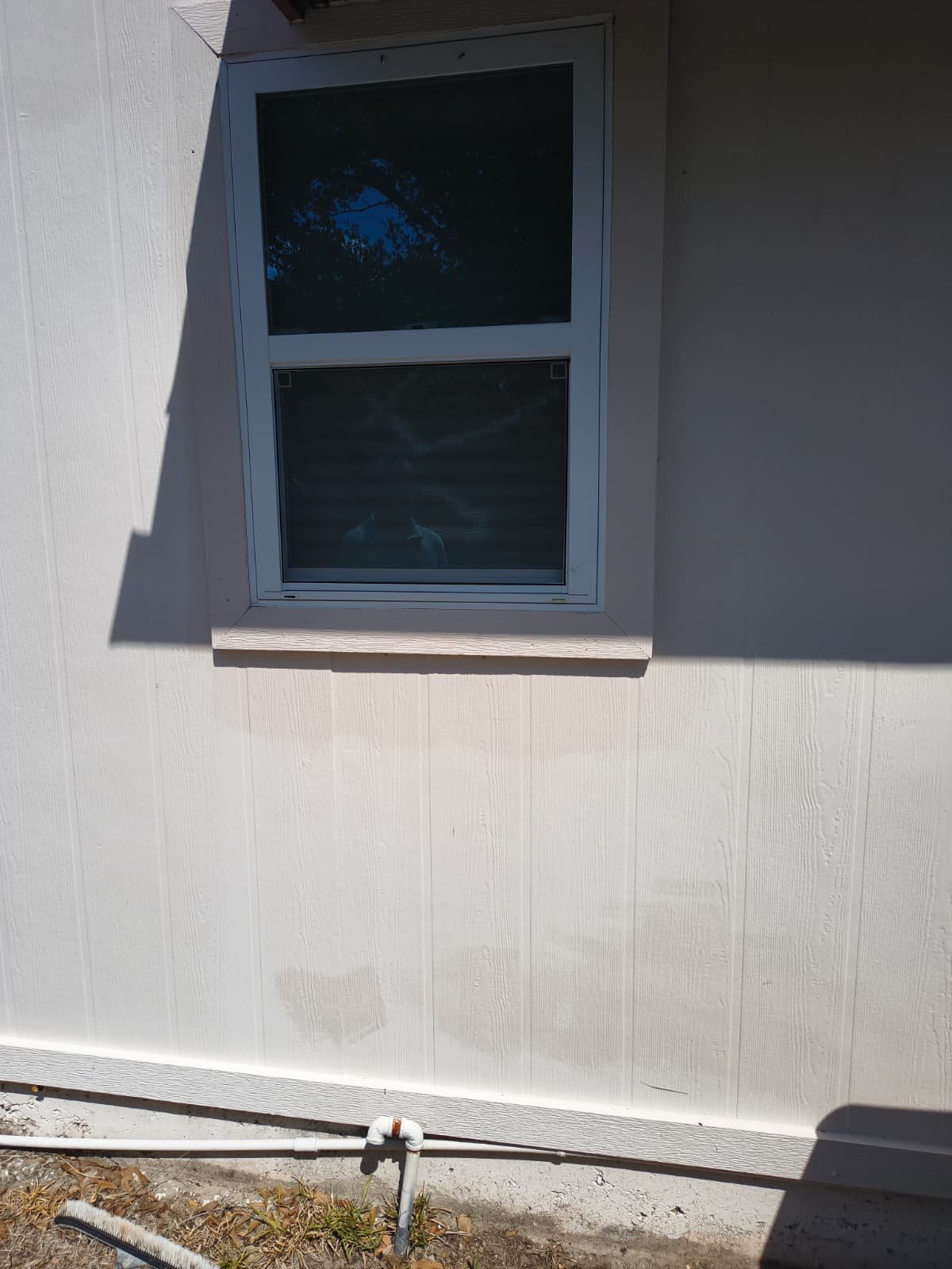 Exterior Plumbing in Tampa, FL 33635 Exterior wall with window and pipe in Tampa, FL 33635.