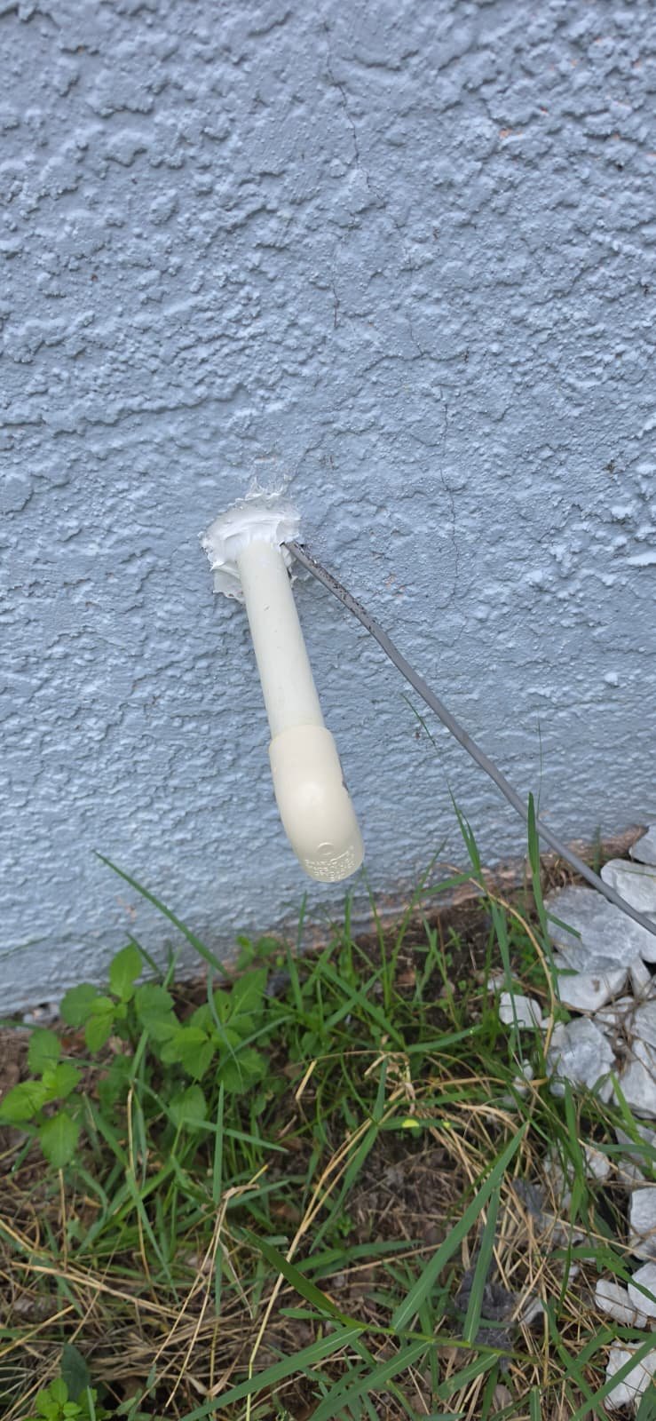 Exterior PVC Pipe - Tampa, FL 33626 PVC pipe on exterior wall, plumbing service in Tampa, FL 33626.