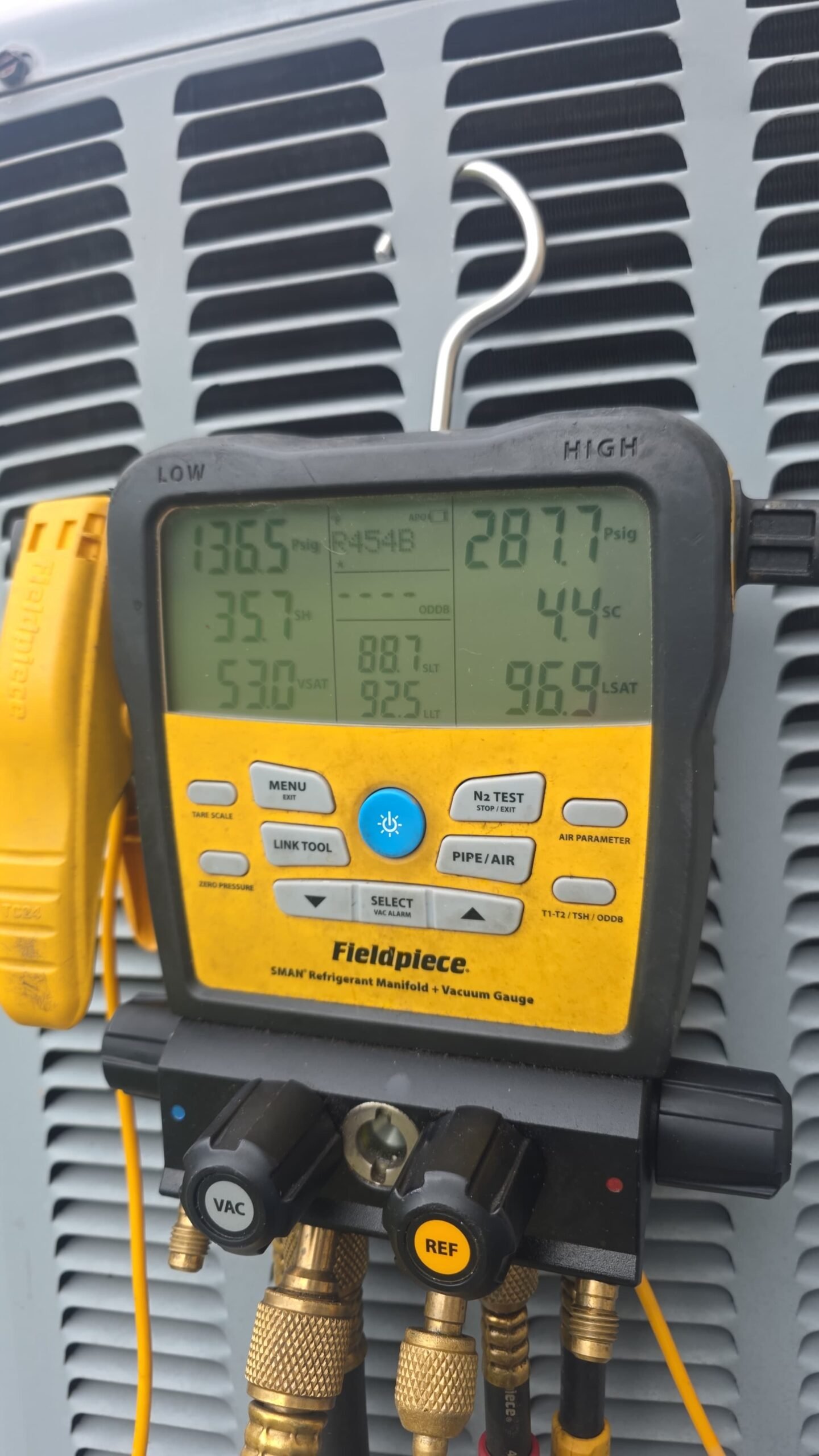 Fieldpiece gauge readings on AC unit during Elite Therapy Visit #7, Bradenton, FL 34202.