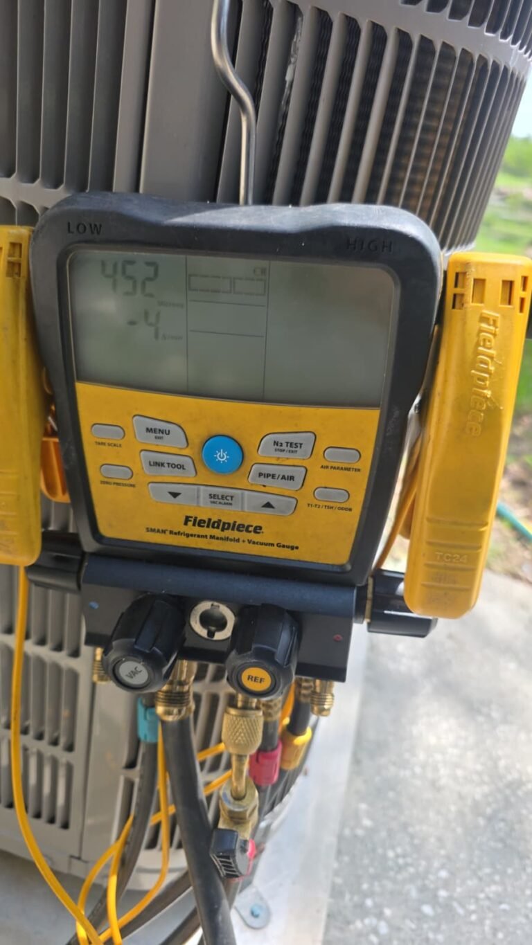 Fieldpiece manifold gauge on HVAC unit in Holiday, FL 34691