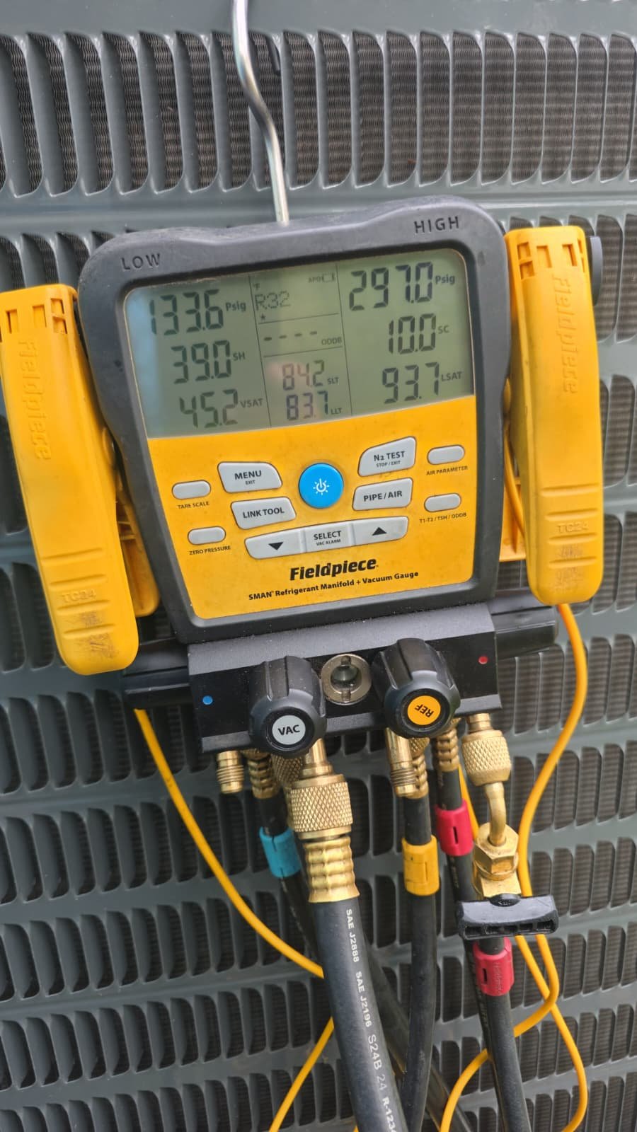 Fieldpiece Gauge Set - Tampa, FL 33616 Fieldpiece manifold gauge set on AC unit, Tampa, FL 33616.