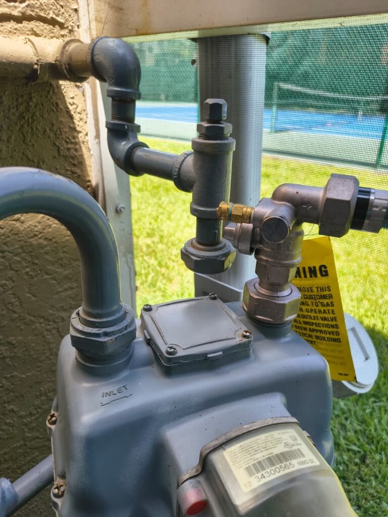 Gas meter and pipes during gas leak repair in Tampa, FL 33611