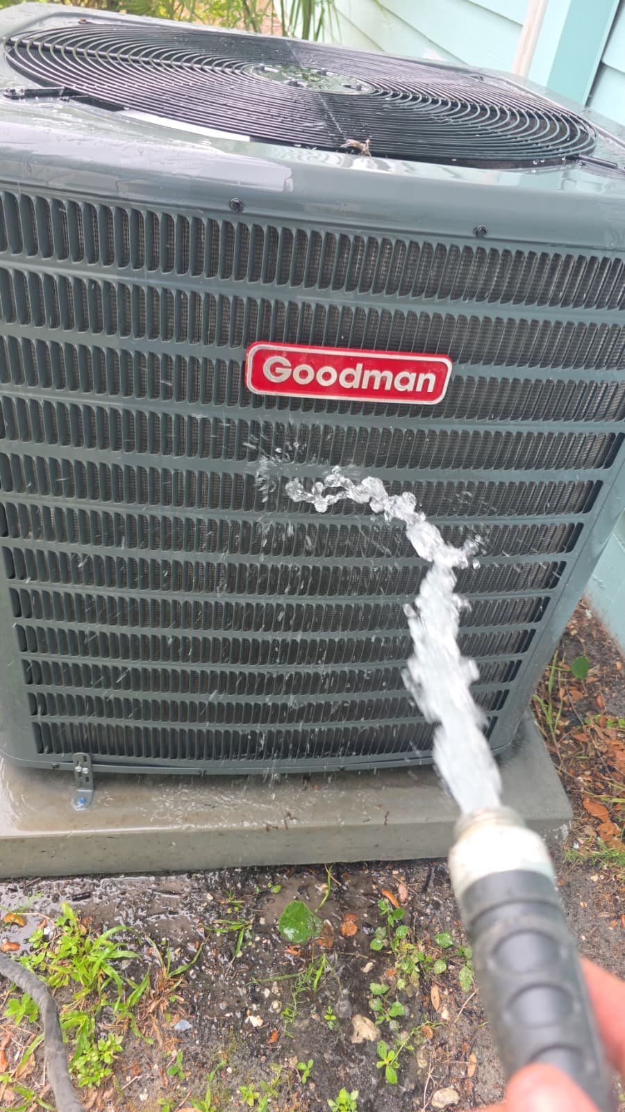 Goodman AC Cleaning - Tampa, FL 33616 Water sprayed on Goodman AC unit, Premium Therapy Plan, Tampa, FL 33616.