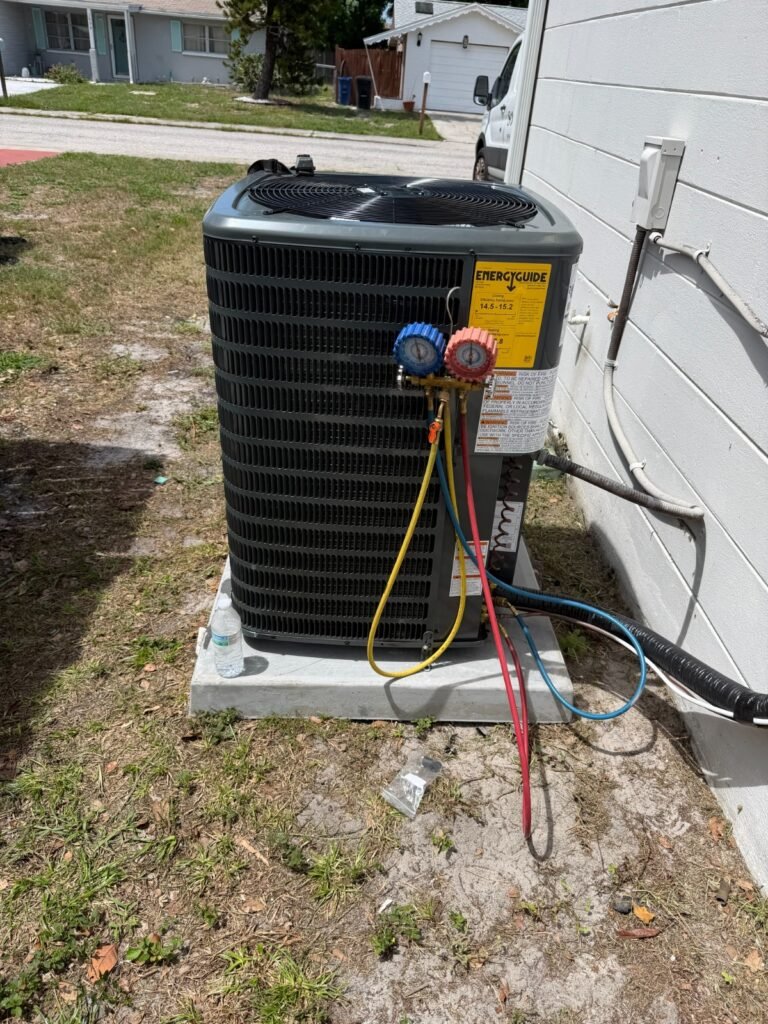 Goodman HVAC unit with gauges in Holiday, FL 34691
