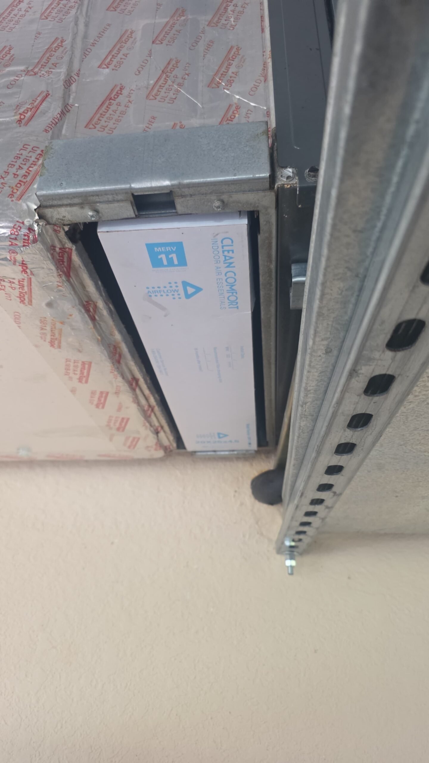 Close-up of air filter in HVAC system, Elite Therapy Visit #7, Bradenton, FL 34202.