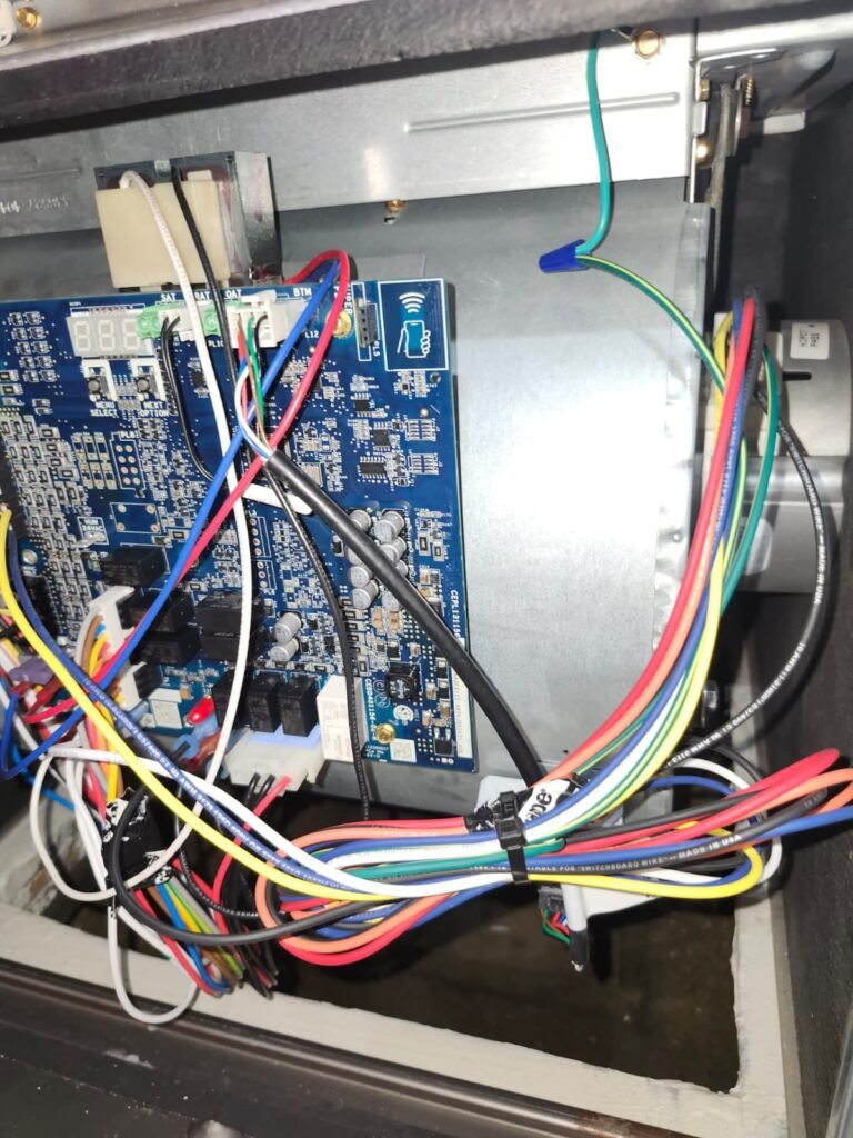An HVAC control board inside an air handler in Land O’ Lakes, FL 34638.