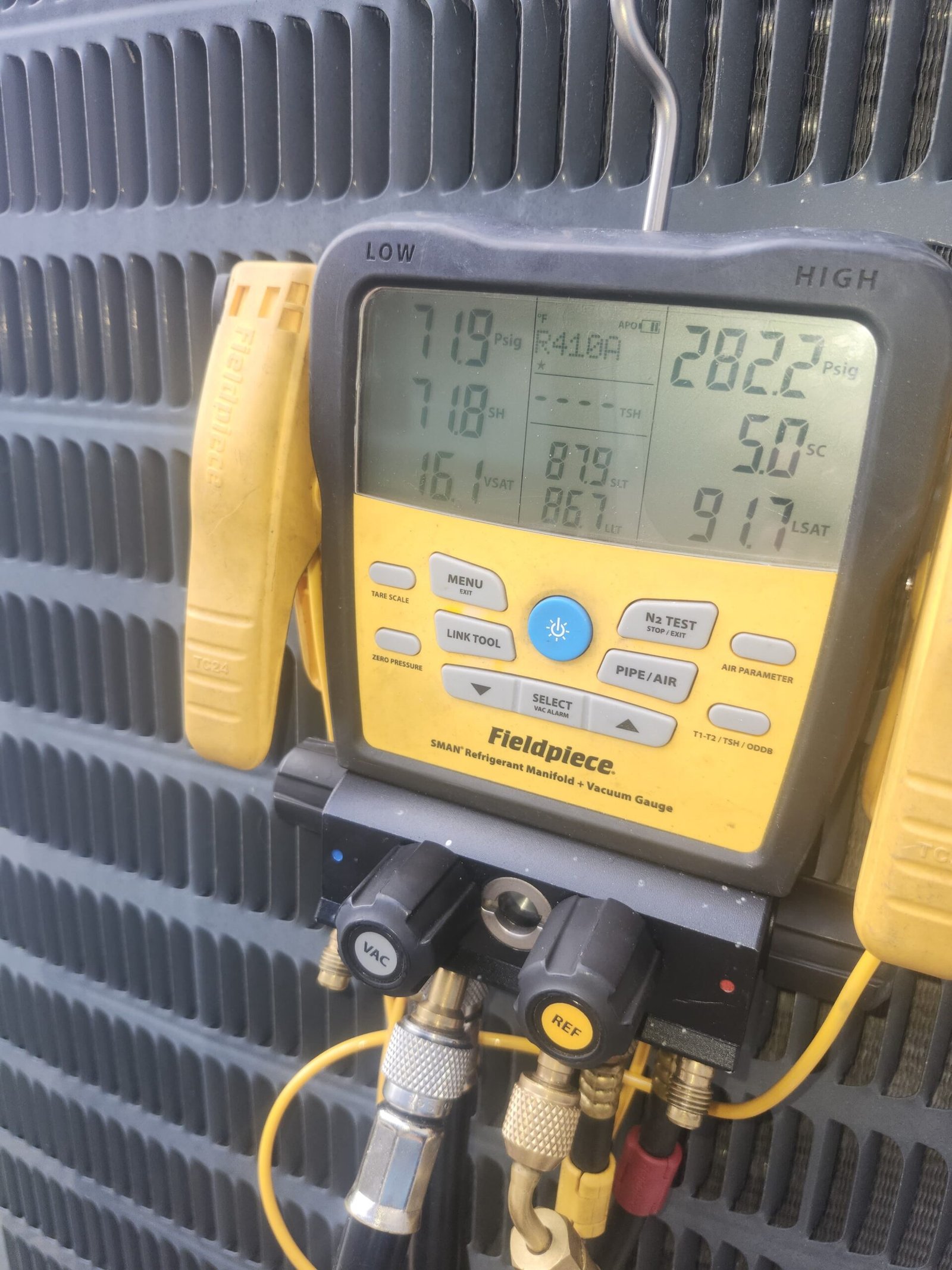 Close-up of HVAC diagnostic tool readings, Land O Lakes, FL 34638.