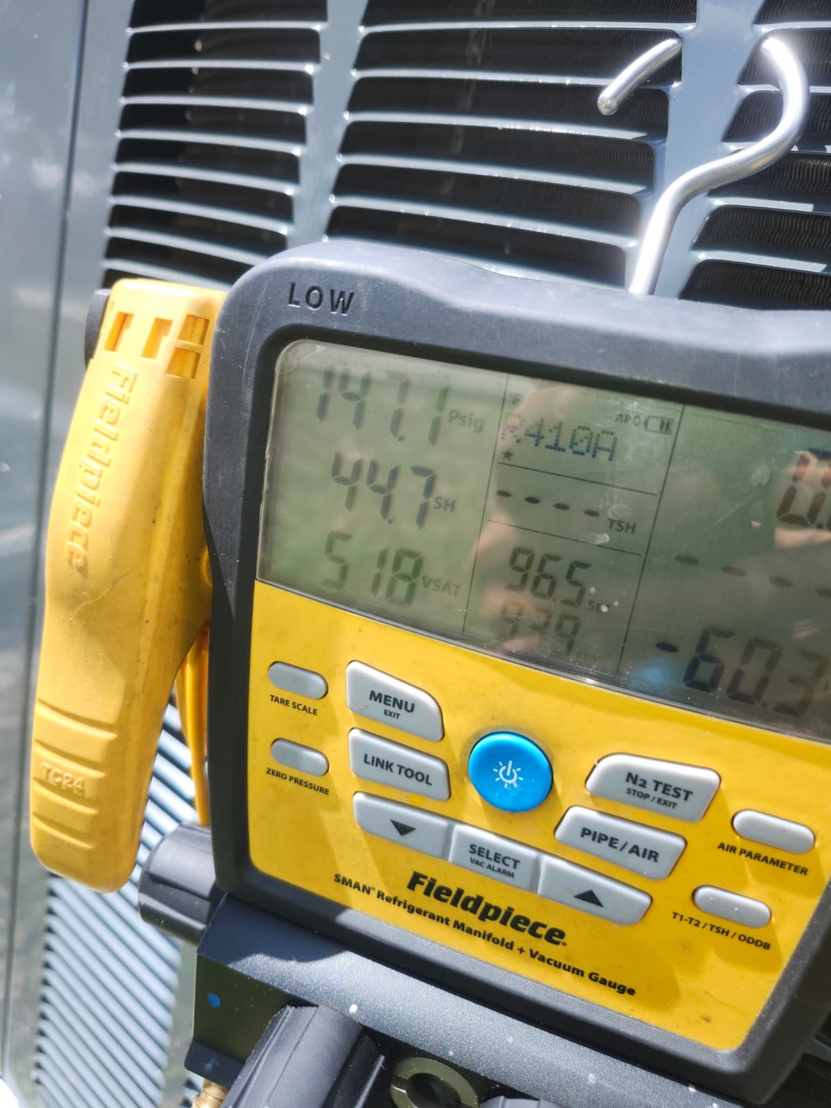 Close-up of HVAC diagnostic tool displaying readings in Odessa, FL 33556. Accurate diagnostics.
