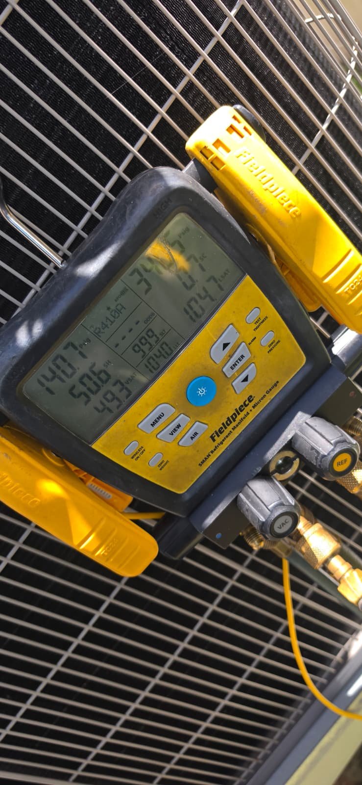 Close-up of HVAC diagnostic tool readings in Odessa, FL 33556. Reliable service.