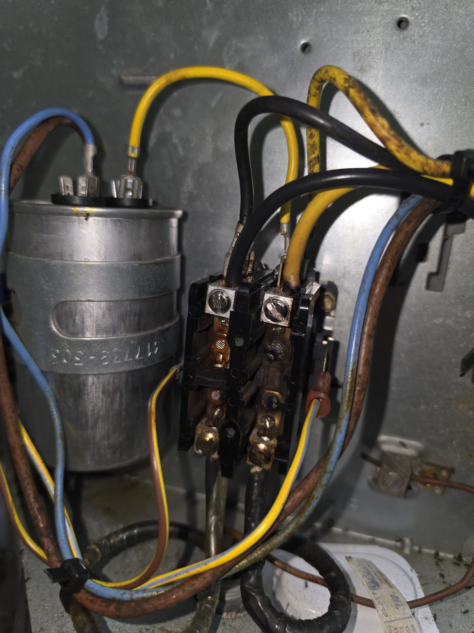 HVAC Electrical Components - Tampa, FL 33625 Close-up of electrical components inside an HVAC unit in Tampa, FL 33625. Detailed system view.
