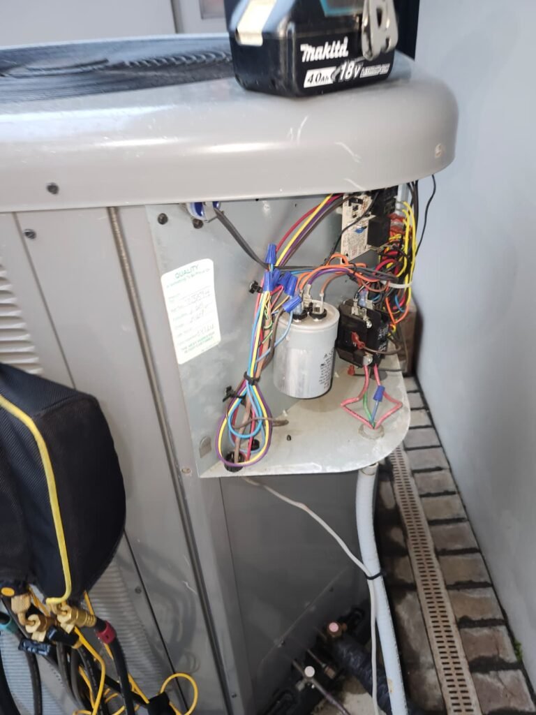 HVAC Unit Electrical Panel Service in Clearwater, FL 33764 Open electrical panel on HVAC unit during service in Clearwater, FL 33764