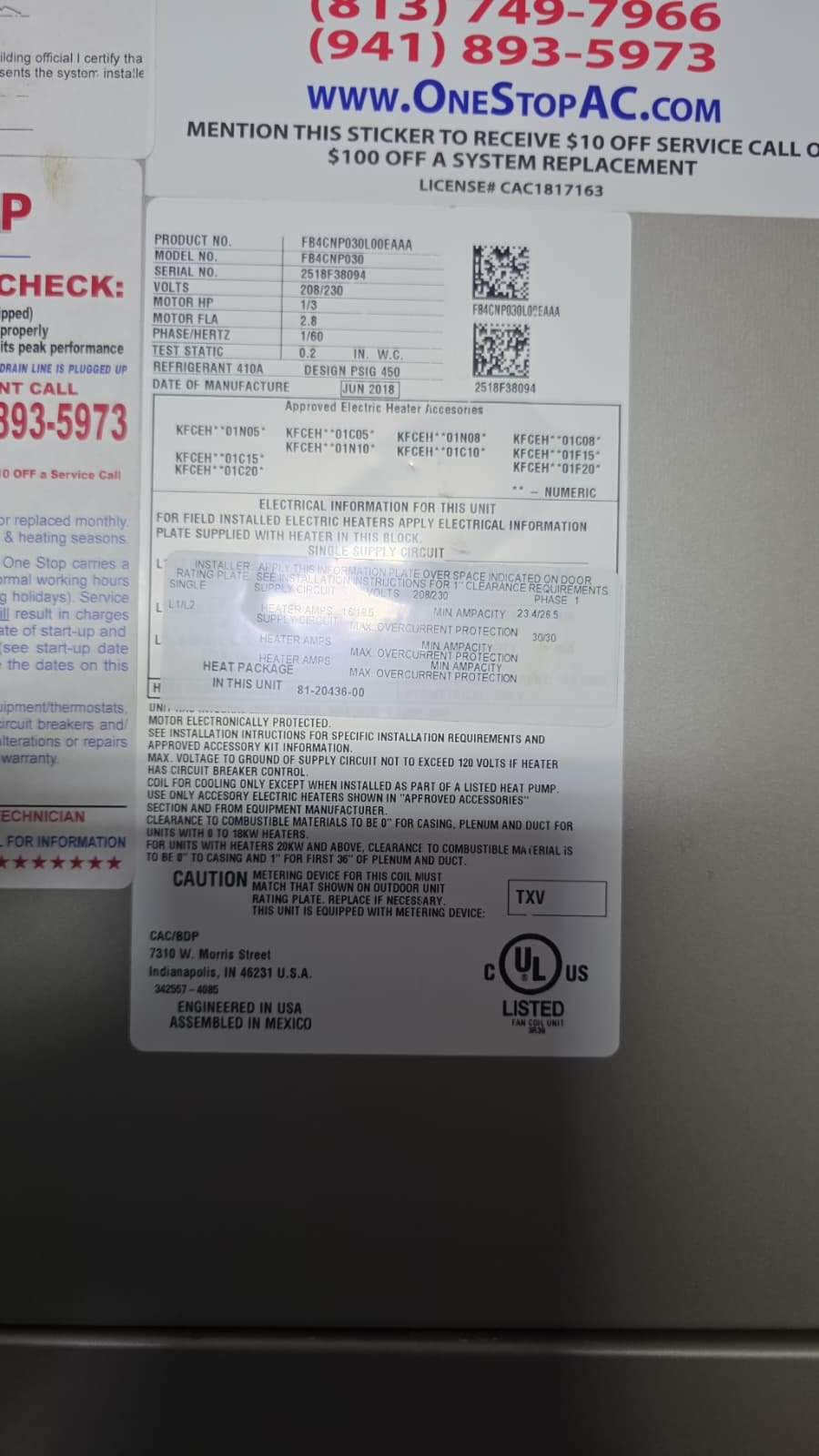 HVAC Equipment Specs - Tampa, FL 33611 Close-up of technical specifications sticker on HVAC equipment, Tampa, FL 33611.