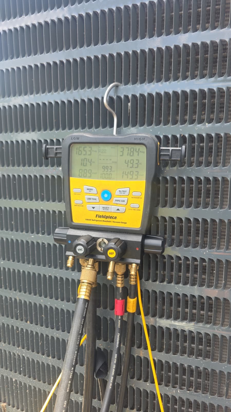 Fieldpiece HVAC gauge displaying readings in Riverview, FL 33579. Key equipment for AC maintenance.